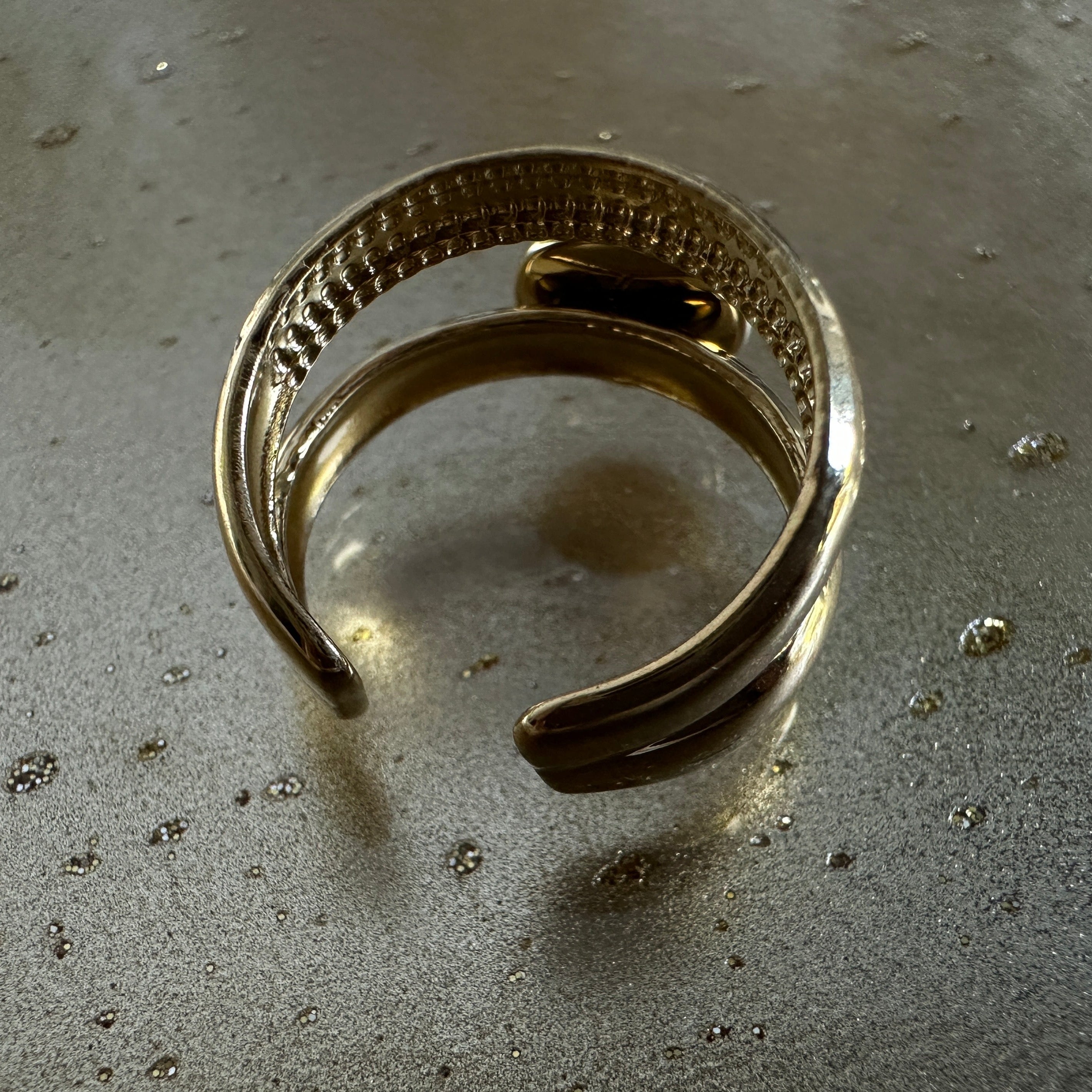 Quiet Anchor adjustable ring gold-tone ring – detail view