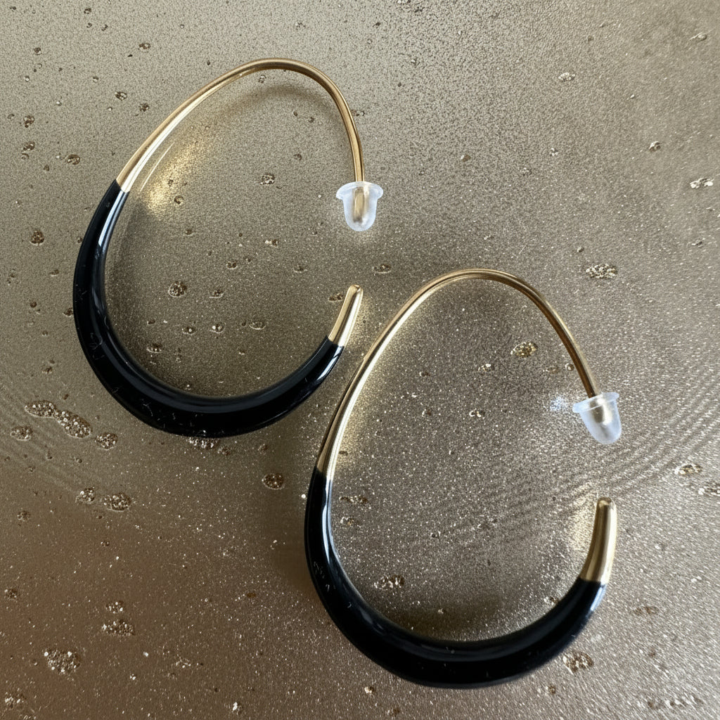 Band & Snap Earrings in Black gold-tone earrings – detail view